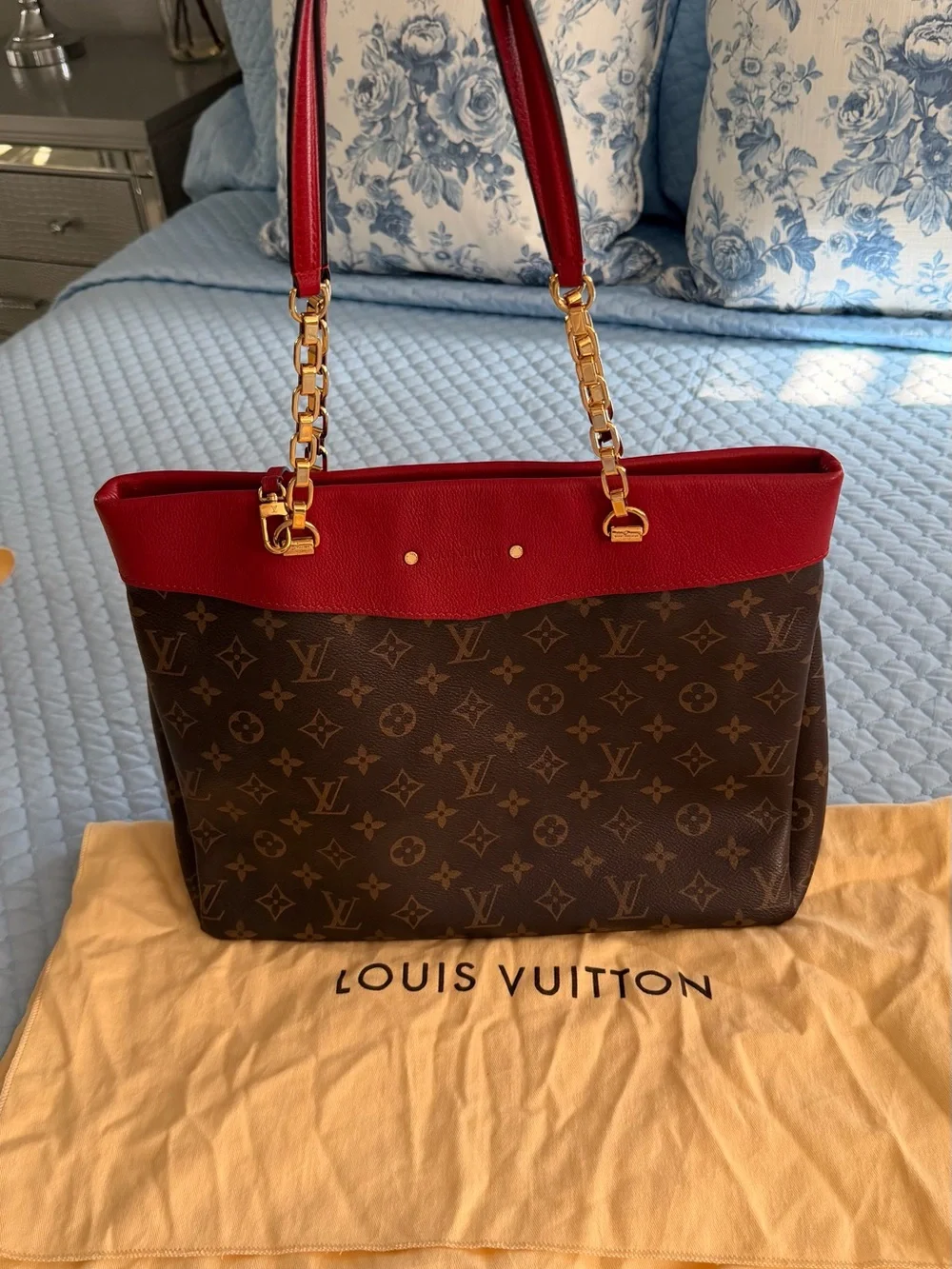 Louis Vuitton Pallas Shopper Tote in Monogram with Red trim.